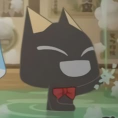 a black cat with a red bow tie standing in front of a tv screen and another cartoon character behind it