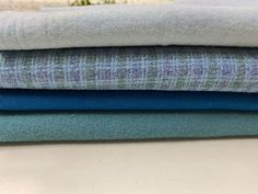 Wool Overload! Rug hooking has been in the family for over 50 years. We have a surplus of wool pieces and would love to share with you. Our addiction is your luck. 100% Wool material. Color: Blue Green Plaid Four pieces that measures     L Blue:              16"x 21"     Blue:            16" x 60"     Green:              18" x 29"     Plaid:             29" x 34" This bundle is equivalent to 7.08 fat quarters. Based on my price of $5.00 per fat quarter, your cost is $35.40 plus shipping. Rug Hooking, Green Plaid, Fat Quarters, Rug Making, 50 Years, Crafts To Make, Fat Quarter, Over 50, Blue Green