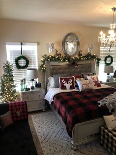 a bedroom decorated for christmas with lights and decorations