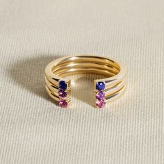 Elegant, colorful, and designed for your every mood. This delicate 10K yellow gold open cuff ring, from the Juliette Maison™ collection, is personalized with two dazzling natural amethyst gemstones. Bonus: because it’s a cuff, it stacks easily with all your favorite rings. Open Cuff Ring, Diamond Solitaire Earrings, Gold Book, Jared The Galleria Of Jewelry, Cuff Ring, Peridot Stone, Cuff Rings, Peridot Gemstone, Aquamarine Stone