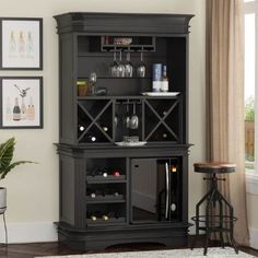 a black cabinet with wine glasses on it