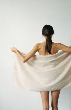 A flat-ribbed texture sweeps around the length of this thick, thirsty hand towel made to be a luxurious addition to your bathroom in soft organic cotton. 27.5" x 55.11" 100% organic cotton Machine wash, tumble dry Made in Portugal Towels In Bucket, Head Towel And Robe, Spa Towel Folds, Bath Time Routine, Modern Towels, Time Routine, Guest Toilet, Checkerboard Pattern, Cotton Bath Towels