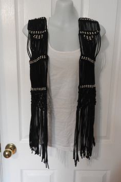 "Rare Handmade  Fringed Vest. Over 200 metal beads are incorporated into this  stunning macrame vest. Open front with a great hang a design that alternates straight  strands and tied knots. The bottom of the  vest is adorned with 10 \" fringes. This is a very cool vest. There are no tags as it is handmade, but seems that is would fit a small, The fabric is not hard and stiff even though it is macrame,  it is soft  in a  cotton blend. Length with Fringes : 27\" Armholes :20 \" circumference Width Macrame Vest, Festival Vest, Beads Macrame, Fringe Vest, Macrame Boho, Vest Outfits, Boho Festival, Metal Beads, Womens Vest