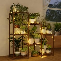 PRICES MAY VARY. Plant Stand Indoor with Flower Fairy Lights：The flower fairy lights are waterproof, making them suitable for indoor and outdoor. The lights are powered by 3 AA batteries (not included) which provide up to 5 hours of continuous lighting on a single charge. Multifunctional Application： Natural Living Space: Transform any space - living room, bedroom, office, or balcony - into a vibrant paradise. This versatile plant stand not only serves as a decorative and storage shelf but also showcases your precious plants. Durable and Sturdy： This plant stand requires no screws, making it perfect for DIY enthusiasts. Utilizing the clever application of the triangular stability principle, it enhances stability. Additionally, plastic joints reinforce the structure of the plant stand, ensu Shelf Ladder Decor Bedroom, Plant Stand Boho, Bamboo Apartment Decor, Living Room Plant Stand, Plant Shelf Ideas Living Room, Skylight Plants, Bohemian Balcony Ideas, Indoor Plant Setup, Fairy Living Room