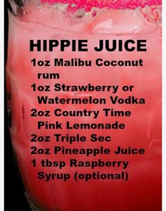 a pink drink is in a glass with the words hippie juice written on it