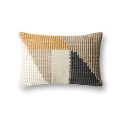 a pillow made from woven material with different colors and patterns on the front, along with a white background