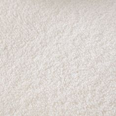 the texture of white carpet is very soft