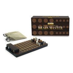 a wooden board game set in front of a brown box with white dots on it