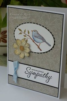 a card with a bird and flower on it