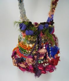 a multicolored handbag hanging on a wall