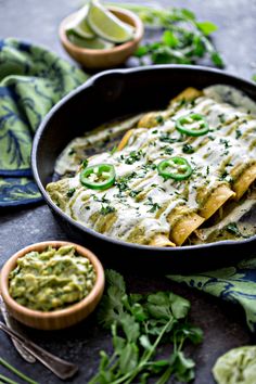 mexican food with guacamole and salsa on the side