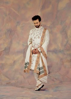 Elegance in every stitch: The Ivory in Malaga Sherwani Set Jatin Malik, Embroidered Sherwani, Long Trail, Dhoti Pants, Embroidered Border, Indian Wedding Outfits, Satin Color, Churidar, Embroidered Silk