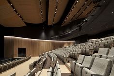 an empty auditorium with rows of seats