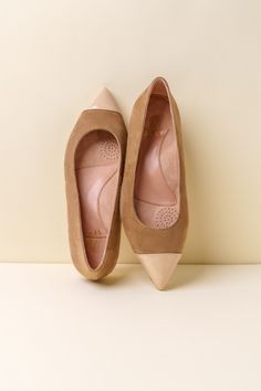 This chic, pointed-toe flat is celebrated for all-day comfort and superior fit. The classic design is polished and pairs well with any outfit. The handcrafted leather upper is padded with an ergonomically-designed insole, built-in metatarsal and arch support, and available in half sizes and 4 different widths. Chic Leather T-strap Toe Post Sandals, Leather T-strap Sandals With Toe Loop, Taupe Leather Boots, Medium Width, Tan Suede