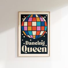 a colorful poster hanging on the wall above a bed