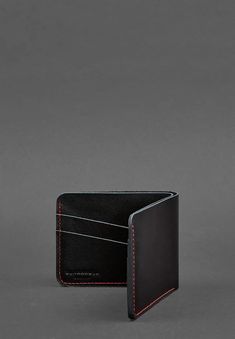 Discover the Designer Compact Men's Leather Wallet, where elegance meets craftsmanship. Made from luxurious genuine leather, this wallet offers a sleek and sophisticated design tailored for the modern man. Its compact form ensures easy carrying without compromising on storage, with multiple card slots and a bill compartment thoughtfully arranged for maximum convenience. The wallet's fine leather finish exudes a timeless charm, making it the perfect blend of practicality and style. Whether for da Black Bifold Wallet For Formal Occasions, Blank Notes, Leather Finish, Elegant Man, Designer Wallets, Charm Making, Leather Pieces, Leather Wallet Mens, Electronic Devices