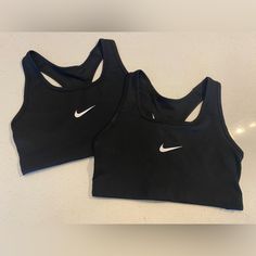 Set Of 2 Nike Sports Bras. Brand New Never Worn. Size M. Black With No Padding. Nike Basic Activewear For Sports, Nike Basic Activewear For Workout, Basic Nike Activewear For Workout, Nike Pros And Sports Bras, Cheap Nike Sports Bra, Black Nike Sports Bra For Sports, Fitted Black Nike Sports Bra, Cute Sports Bras Nike, Nike Black Fitted Sports Bra