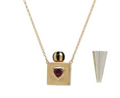 This Rachel Quinn necklace is a statement-making timeless pendant as well as a vessel to keep something precious close to your heart. The center of the vessel has a faceted rhodolite garnet heart for the perfect amount of sparkle. The14K yellow gold and black enamel ball top has a tiny magenta sapphire in it's center. It unscrews and is attached by an inner chain. It hangs from the center of the 14K yellow gold adjustable chain. The pendant comes with a sterling silver funnel to easily fill your Heart Vessels, Jewelry Facts, Daniela Villegas, Alice Cicolini, Twist Jewelry, Garnet Heart, Box Necklace, The Vessel, Cathy Waterman