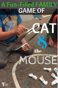 two children are playing with their cat and the mouse in front of them is an image that says, a fun - filled family game of cat and 8 the mouse