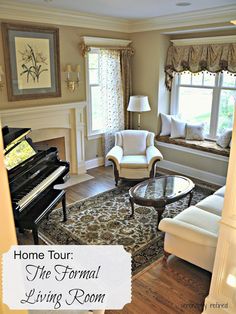 a living room filled with furniture and a piano