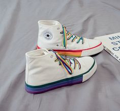 Looking for a shoe that combines style and support for the LGBT community? Look no further than our Rainbow Bottom LGBT Pride Shoe, designed with vibrant rainbow accents and embroidered details to help you express your pride and show your support. Our Rainbow Bottom LGBT Pride Shoe is the perfect choice for anyone who wants to make a statement while staying comfortable and supported. Whether you're walking in a parade, attending a festival, or just out and about, our shoes are perfect for any oc Women High Top Sneakers, Pride Shoes, Rainbow Laces, Shoes Stand, Pride Parade, Lgbt Pride, Mixed Colors, Shoe Size Chart, Casual Shoes Women