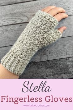 the fingerless gloves are knitted and ready to be worn on someone's hand