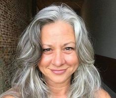 Sherry's gray hair is sooo gorgeous! #greyhair #goinggrey Dark Brown Hair Almost Black, Highlights Light Brown, Silver Hair Transition, Gray Hair Transition, Silver Haired Beauties, Transitioning Hairstyles