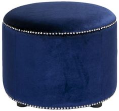 a blue velvet ottoman with studded trimmings on the top and bottom part