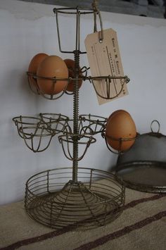 an egg holder with three eggs in it