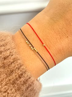 This red string bracelet is made from silk cord and solid 14K gold, 2 mm bead. This bracelet is perfect for everyday wear or as a special gift for a loved one. Red string of fate bracelet is simple and minimalist decorated with 14K gold bead Red String Of Fate Bracelet, String Of Fate, Red String Of Fate, Red String Bracelet, Red String, Protection Bracelet, Silk Cord, Cord Bracelet, Solid Gold Jewelry