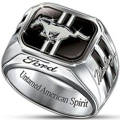 a ring with an image of a horse and the words ford on it in silver