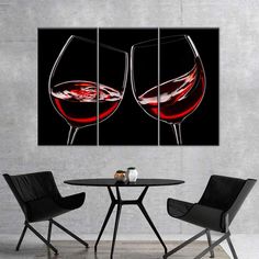 two wine glasses with red wine in them on a black background split panel canvas wall art