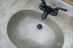 a sink that is made out of concrete