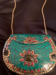 Handmade Evening Bag from Tibet . Each one is one of a kind! Bohemian Hand Painted Shoulder Bag For Everyday Use, Bohemian Hand Painted Bags For Daily Use, Green Bohemian Handheld Bag, Handmade Green Shoulder Bag, Bohemian Clutch With Removable Pouch As Gift, Green Crossbody Clutch As Gift, Artisan Green Shoulder Bag As Gift, Handmade Green Bag For Gift, Green Rectangular Shoulder Bag For Festival