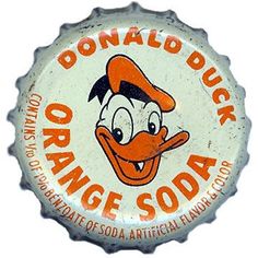 an orange soda bottle cap with the words donald duck on it