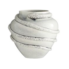 a white ceramic vase with snakes on the top and bottom, sitting in front of a white background