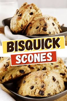 some cookies are sitting in a bowl on a table with a sign reading bisquick scones