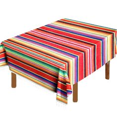 a multicolored striped tablecloth with wooden legs