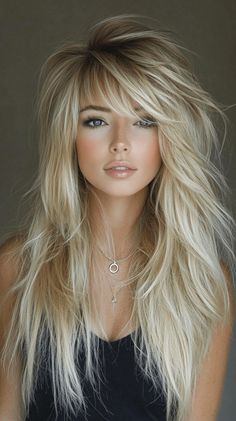 Blonde Shag Haircuts: 18 Trendy Ideas to Refresh Your Look Shaggy Womans Haircut, Long Blonde Fine Hair With Layers, Rocker Blonde Hair, Fine Layered Hair Long, Extra Layered Hair, Shaggy Long Haircut, Blonde Hair Color Ideas With Bangs, Soft Shaggy Hair, Blonde Hair With Bangs And Layers