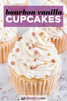 bourbon vanilla cupcakes with white frosting and sprinkles on top