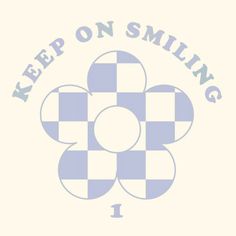 the words keep on smiling are shown in blue and white checkerboard pattern, as well as an image of a four - leaf clover