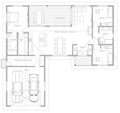 the floor plan for a two story house with an attached garage and living room area