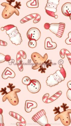 a pink background with gingerbreads and snowmen on it's face,