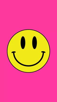 a yellow smiley face on a pink background