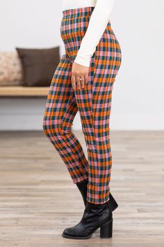 Product Details Colors: Orange, Blush, Teal Print: Plaid Style: Pull On Pants Material and Care 95% Polyester 5% Spandex Machine Wash Cold Line Dry Size and Fit Rise: 12" Inseam: 28" Small: Waist 26" Medium: Waist 27" Large: Waist 28" Photo model is 5'1 and wearing a size small Video model is 5'3 and wearing a size small Red Plaid Pants Nordstrom, Orange Blush, Colors Orange, Orange Plaid, Photo Model, Plaid Fashion, Pink Plaid, Pull On Pants, Small Waist