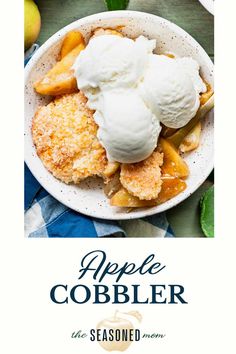 an apple cobbler with ice cream on top in a white bowl next to apples