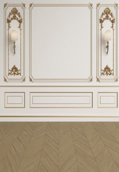 an empty room with white walls and gold trimmings on the wall, along with a chevron parquet floor