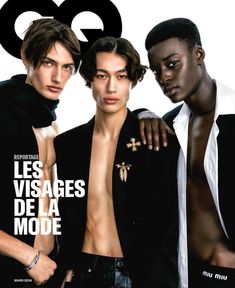 three men standing next to each other on the cover of gq magazine, one wearing a jacket