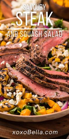 steak and squash salad with feta cheese in a wooden bowl on a table top