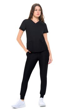 PRICES MAY VARY. 86% Nylon, 14% Spandex Imported Incredible Stretch, Comfort, and Breathability: The Ultra Stretch material is designed to keep you cool, dry and comfortable throughout the work day while providing incredible all-directional stretch to ensure the perfect form fit. Top: V-neck, Two Lower Pockets, Short sleeve, Back Princess Seams, Double-needle stitching at seams. Pant: Mid-rise Jogger, Pull-on Elastic Waistband, Slimming side panels, 2-Front slash pockets and 2-Back pockets, Knit Black Jogger Scrubs Outfit, Black Scrubs Outfit With Long Sleeve, Scrubs Uniform Black, Black Stretch Nursing-friendly Bottoms, Womens Jogger, Black Scrubs, Women's Uniforms, Safety Clothing, Scrub Sets